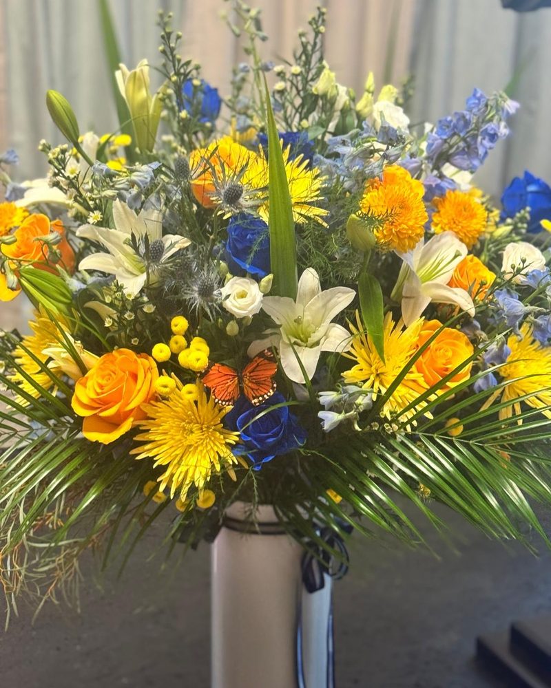 Abanico azul y oro para evento